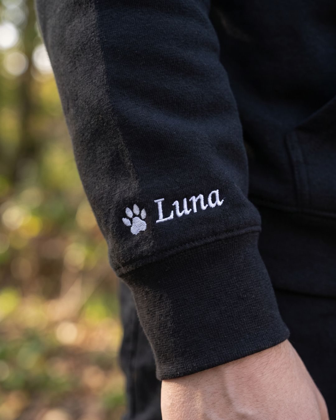 Pet name embroidered under the portrait