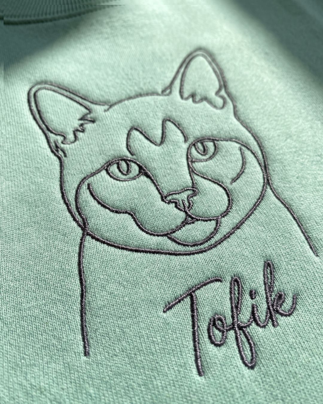Model wearing the one-line pet portrait hoodie