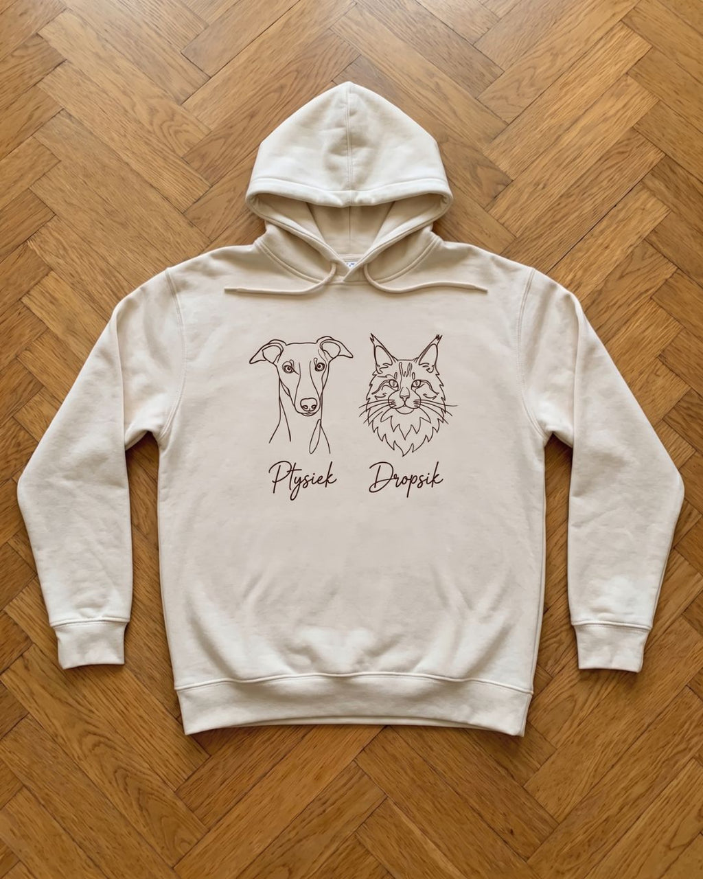 One-line hoodie shown with the pet it was made from