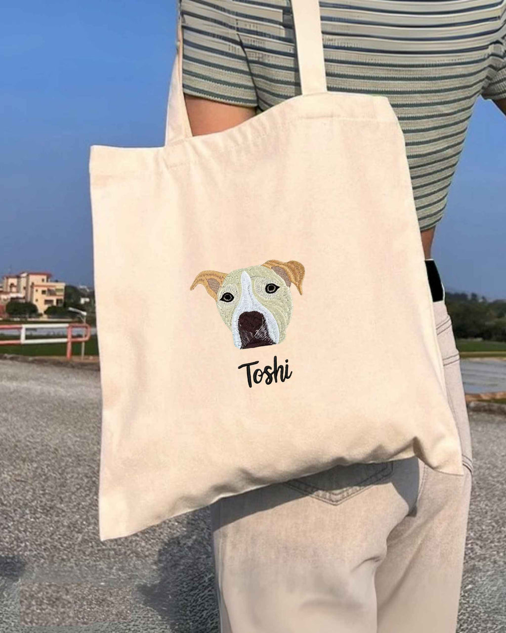 Natural canvas tote carried over the shoulder